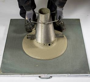 Comparison of two specifications for cementitious grouts